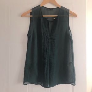 Emerald green sleeveless blouse